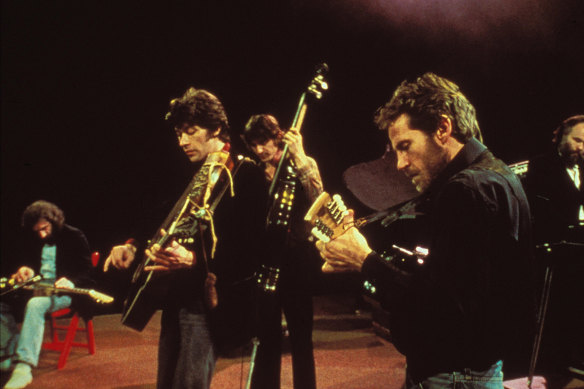 Robbie Robertson et d'autres membres de The Band.