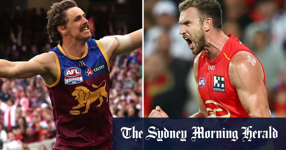 Le remplaçant des Lions de Brisbane Joe Daniher, Sam Day, soutenu par la star des Gold Coast Suns Ben King