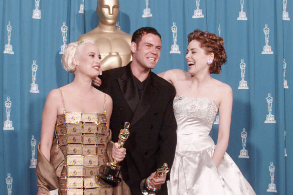 Tim Chappel, Lizzy Gardiner et Sharon Stone aux Oscars.