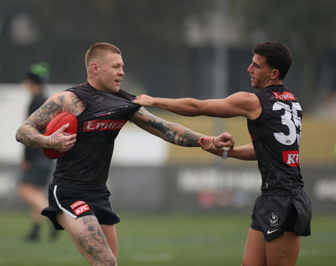 Jordan de Goey (à gauche) et Nick Daicos travaillent par une blessure.