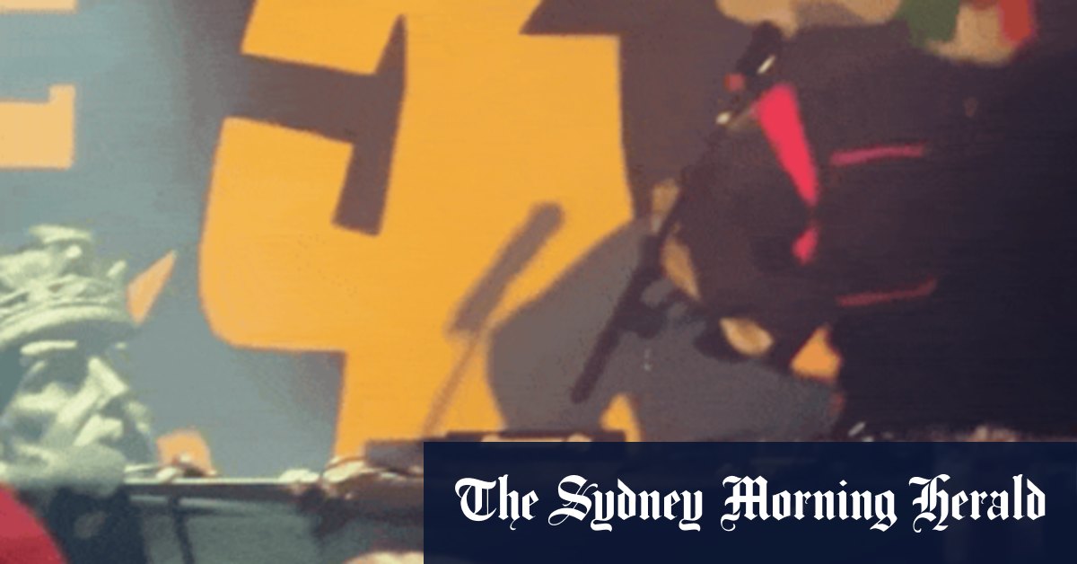 Le concert de Melbourne comprend la tête coupée de la statue du roi George