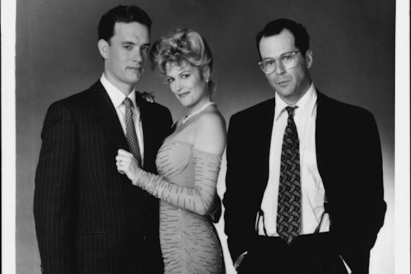 Tom Hanks, Melanie Griffith et Bruce Willis dans le film de 1990, le feu de joie des Vanités. 