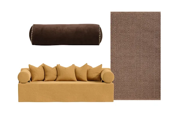 Canapé « Cigare » ; Coussin traversin « Elliot » ; Tapis « SCD Trellisweave ».