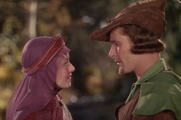 Patricia O'Brien raconte la véritable histoire d'Errol Flynn, vu ici avec Olivia de Havilland dans Les Aventures de Robin des Bois.