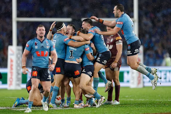 Les joueurs de NSW célèbrent leur retour.