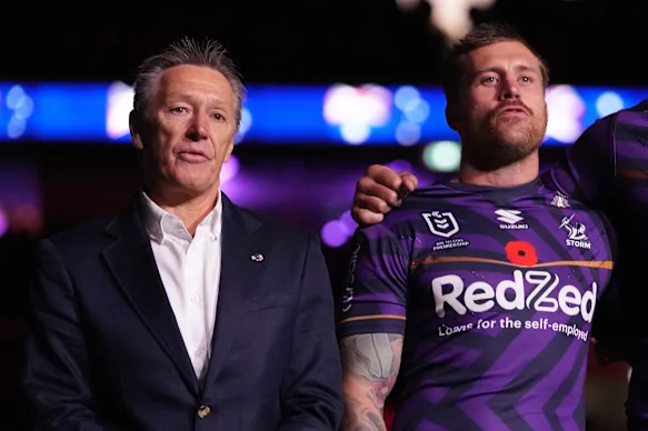 L'entraîneur du Storm Craig Bellamy et le joueur vedette Cameron Munster.