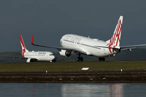 Une photo d'archive d'un Virgin 737 et d'un Qantas 737 à Sydney.