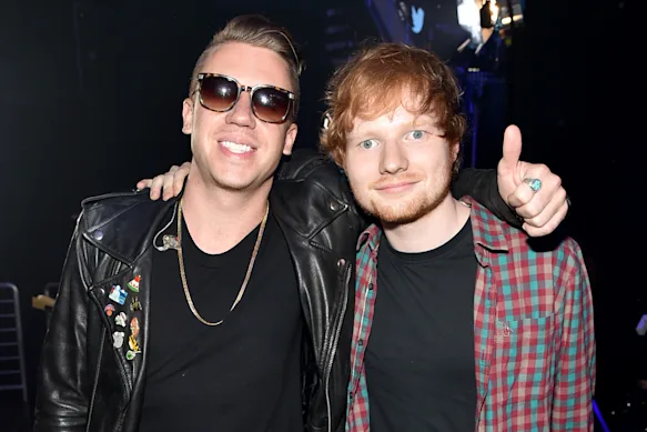 Macklemore et Ed Sheeran, photographiés en 2014. Quatre autres premiers actes de Sheeran ont abandonné sa tournée pour soutenir Macklemore.