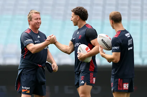 Trent Robinson et Mark Nawaqanitawase lors de la course du capitaine des Roosters. 